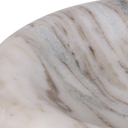 A close-up of a polished white marble surface with soft beige and light gray veining, shown against a white background.