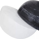 Decorative Marble Sculpture features two contrasting semispheres—one black and one white